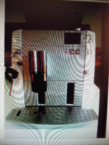 Machine à café Pratiquement neuve