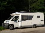 A donner camping car profiléelnagh lit central 4 places - Miniature