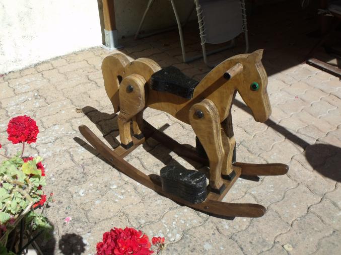 Cheval a bascule en bois  année 50
