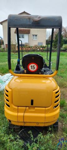 Mini pelle avec remorque