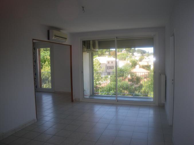 Appartement 66m2 avec balcon et cave