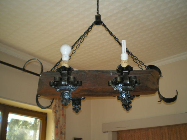 Vend lustre 4 ampoules bois massif.