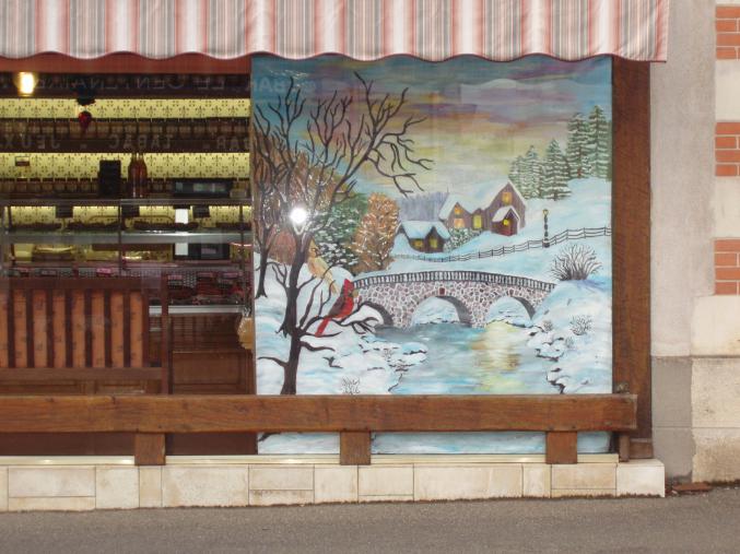 Décors saisonniers sur vitrine de magasins