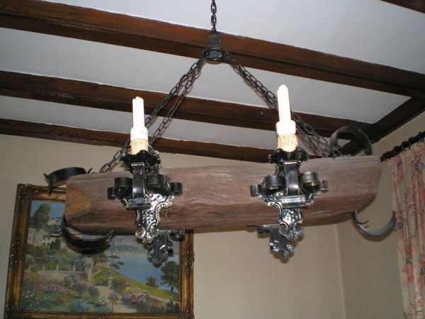 Vend lustre 4 ampoules bois massif.