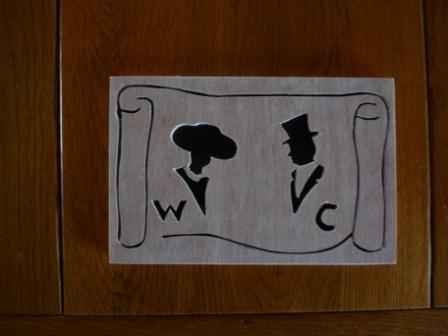 Tableau pour la porte des toilettes