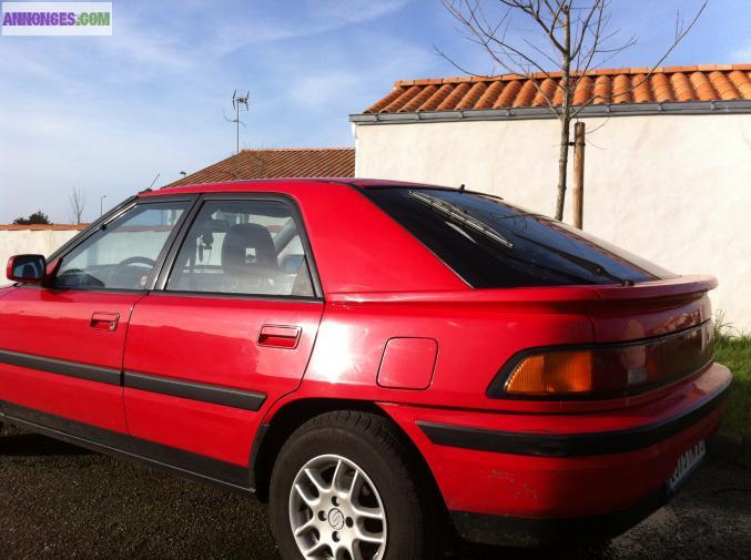 Vends mazda 323 f