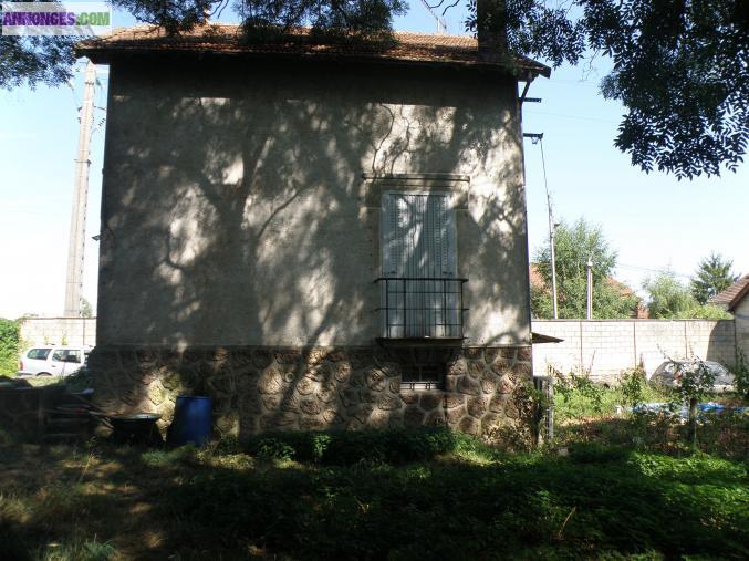 Maison avec terrain.