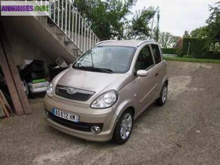 A donner MICROCAR Beige 7900km