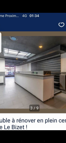 Immeuble mixte commerce et habitation situé en plein centre