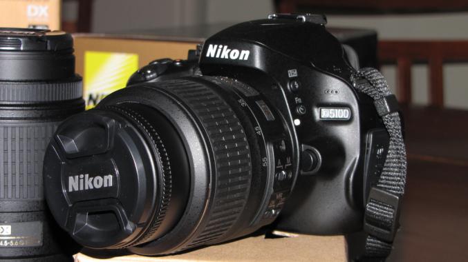 Nikon D5100 DSLR Camera + Lens