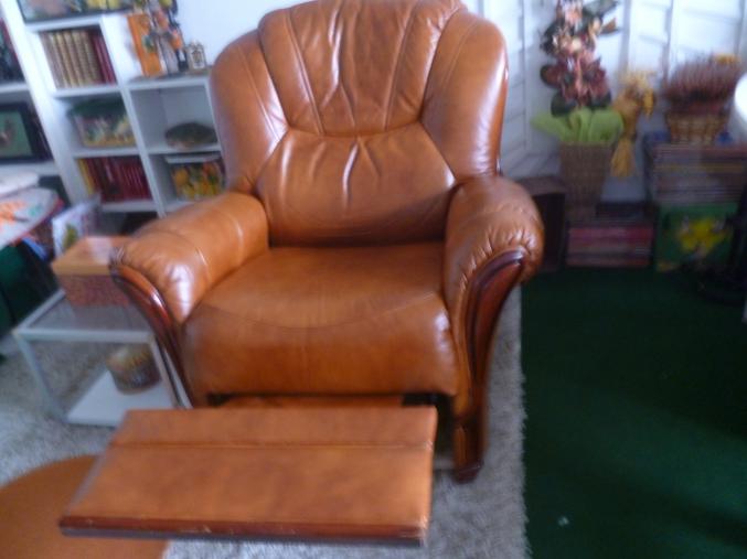 Fauteuil relax en cuirhavane repose pieds rétractable