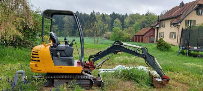 Mini pelle avec remorque