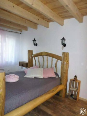 Lit en rondin d'acacia