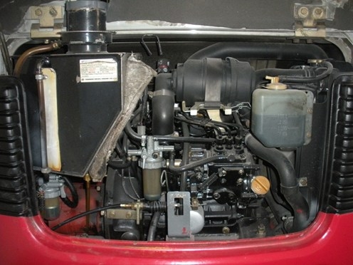 Mini pelle sur chenille caoutchouc