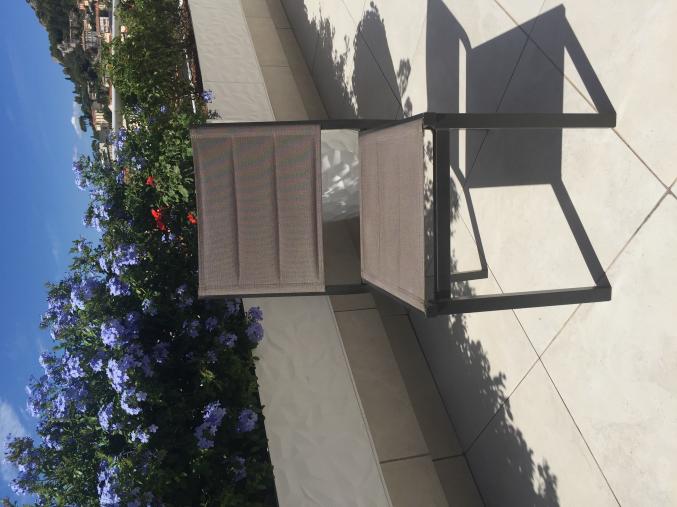 Table jardin plateau verre avec 6 chaises en textilene