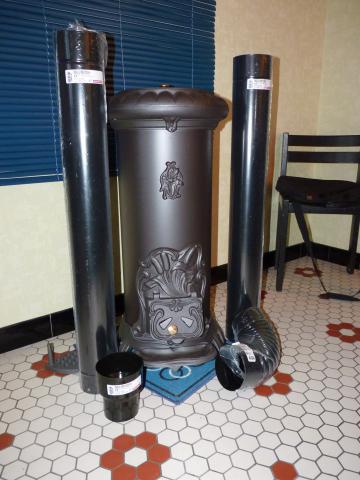 Poele  a  bois  neuf