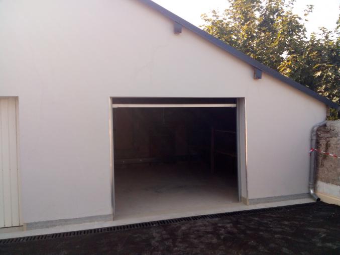 Garage avec un  parking