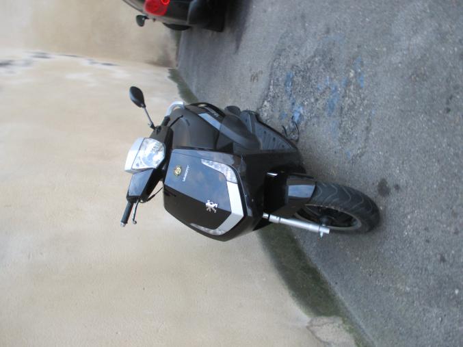 Scooter vivacity roland garros noir et chromes