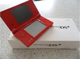 Dsi rouge presque neuve peu utilisée + jeux