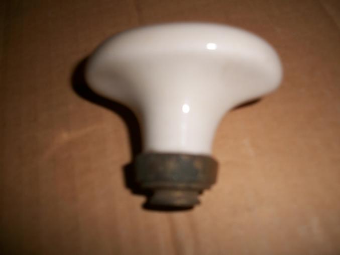 Embout de poignee de porte ou pour reglage fumee