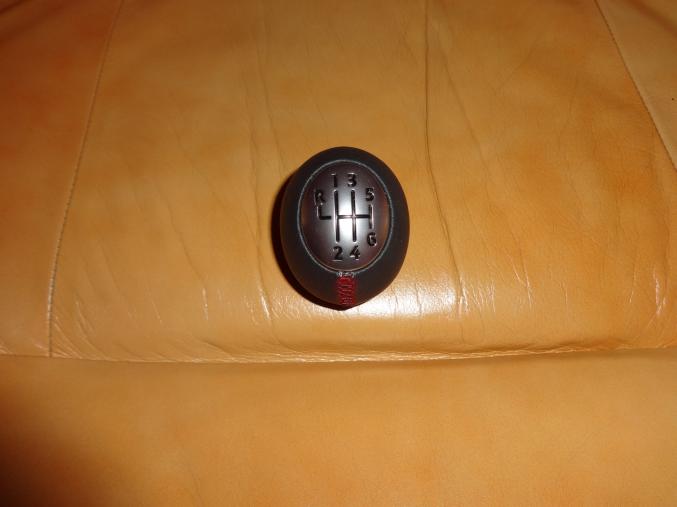 Pommeau couture rouge