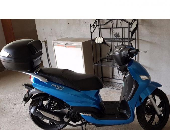 Scooter Peugeot Tweet 125cc état neuf