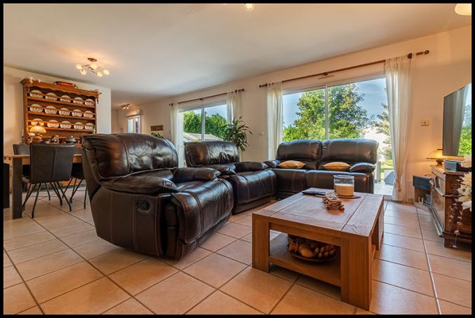 Maison de plain-pied 4 chambres, garage et jardin