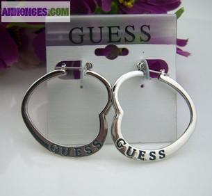 Vend boucle d,oreille  guess