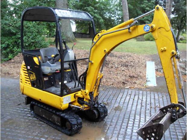 Donne MINI PELLE JCB 8015 de 2003 