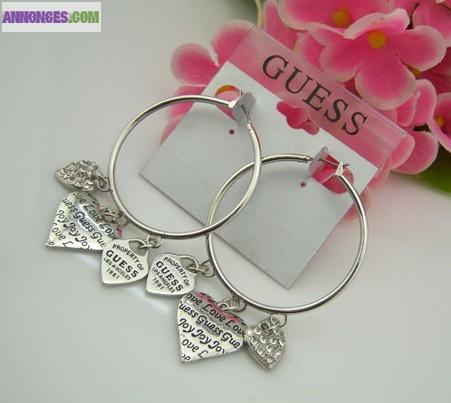 Vend boucle d,oreille  guess