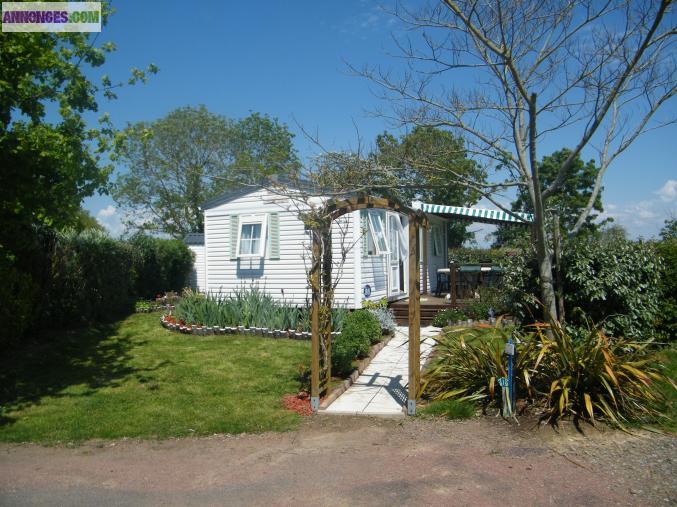 Mobil home + terrain + Abris de jardin et terrasse en bois