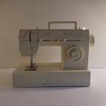 Machine a coudre electronique portable singer - Miniature