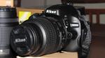 Nikon d5100 dslr camera + lens - Miniature